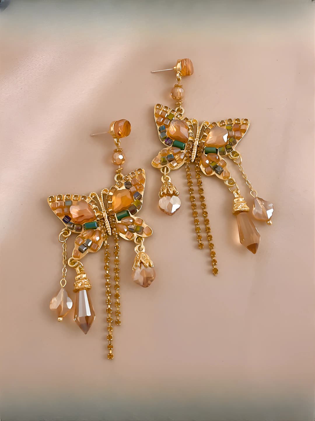 Women's long retro earrings with crystals and rhinestones in butterfly shape