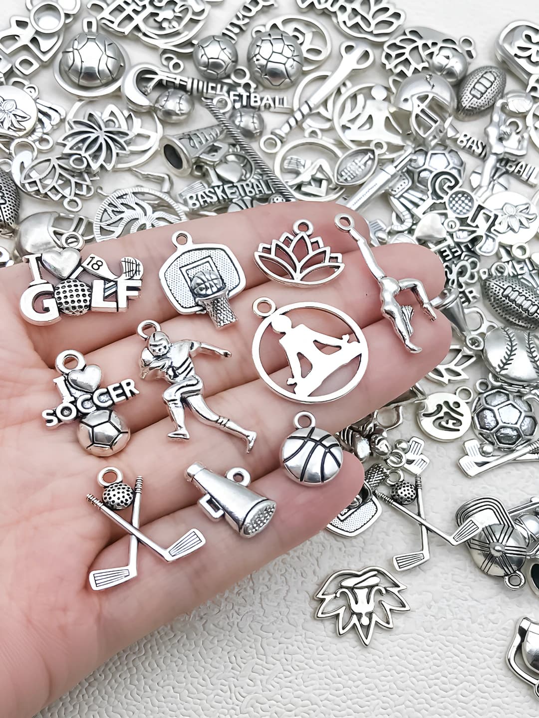 Random 100 pc antique silver sports series-116.6g
