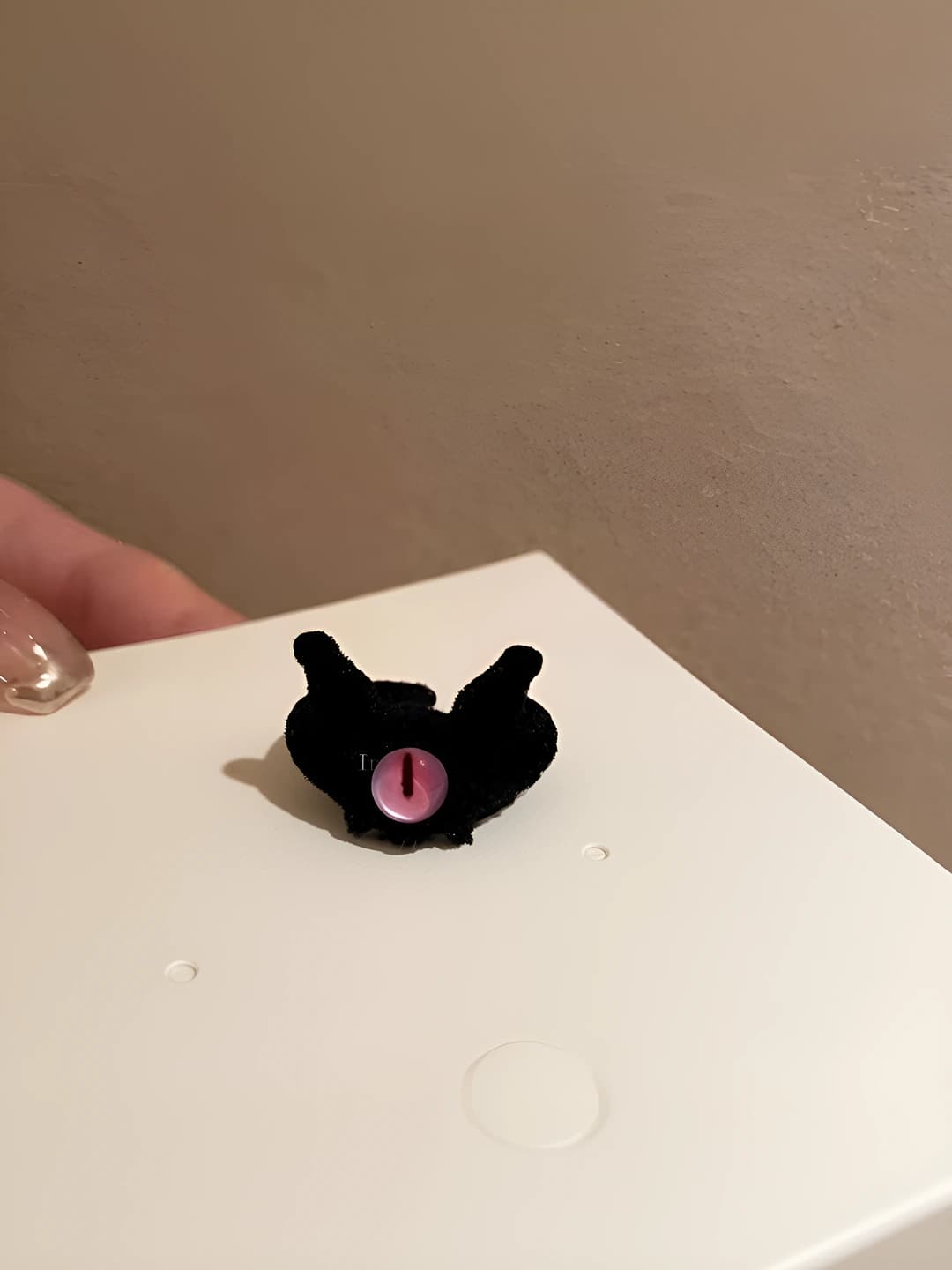 Flocked black one eye ring