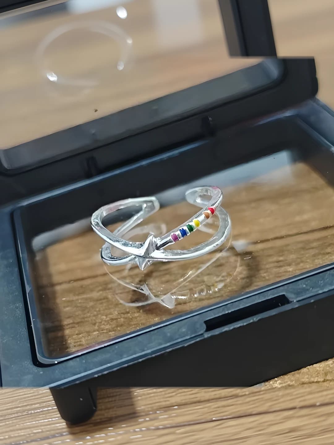 Women's metal ring with geometric shape, rainbow and meteor theme, open design
