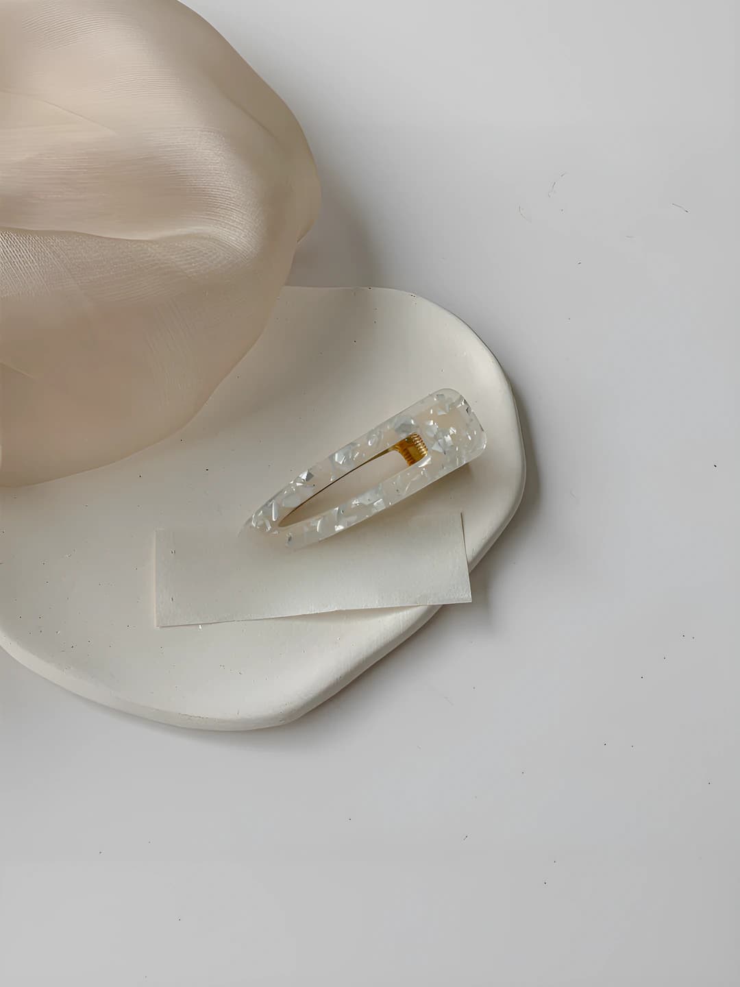 White drop shape