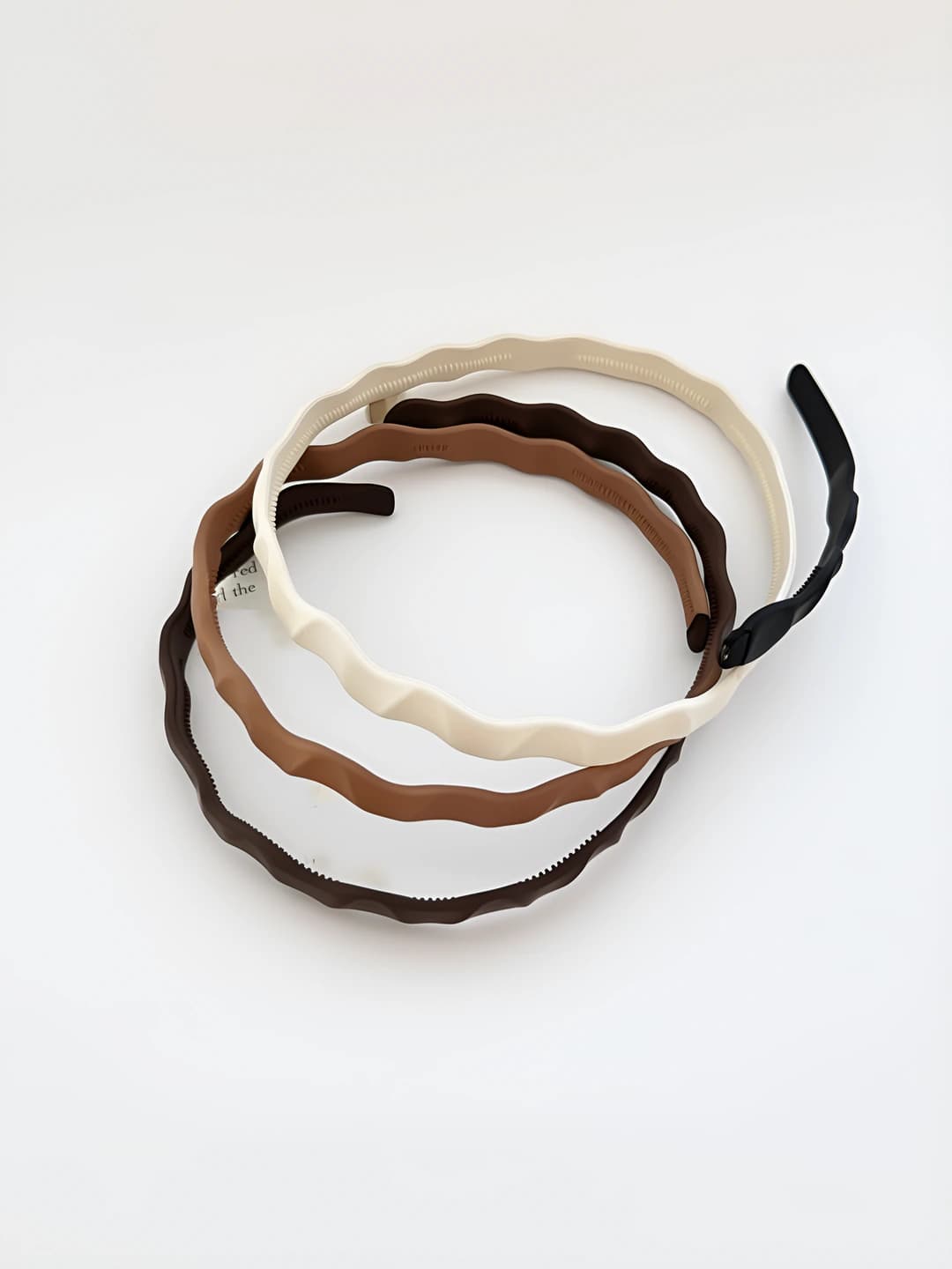 Women's Korean style headband with wavy pattern and matte texture, non-slip with inner teeth