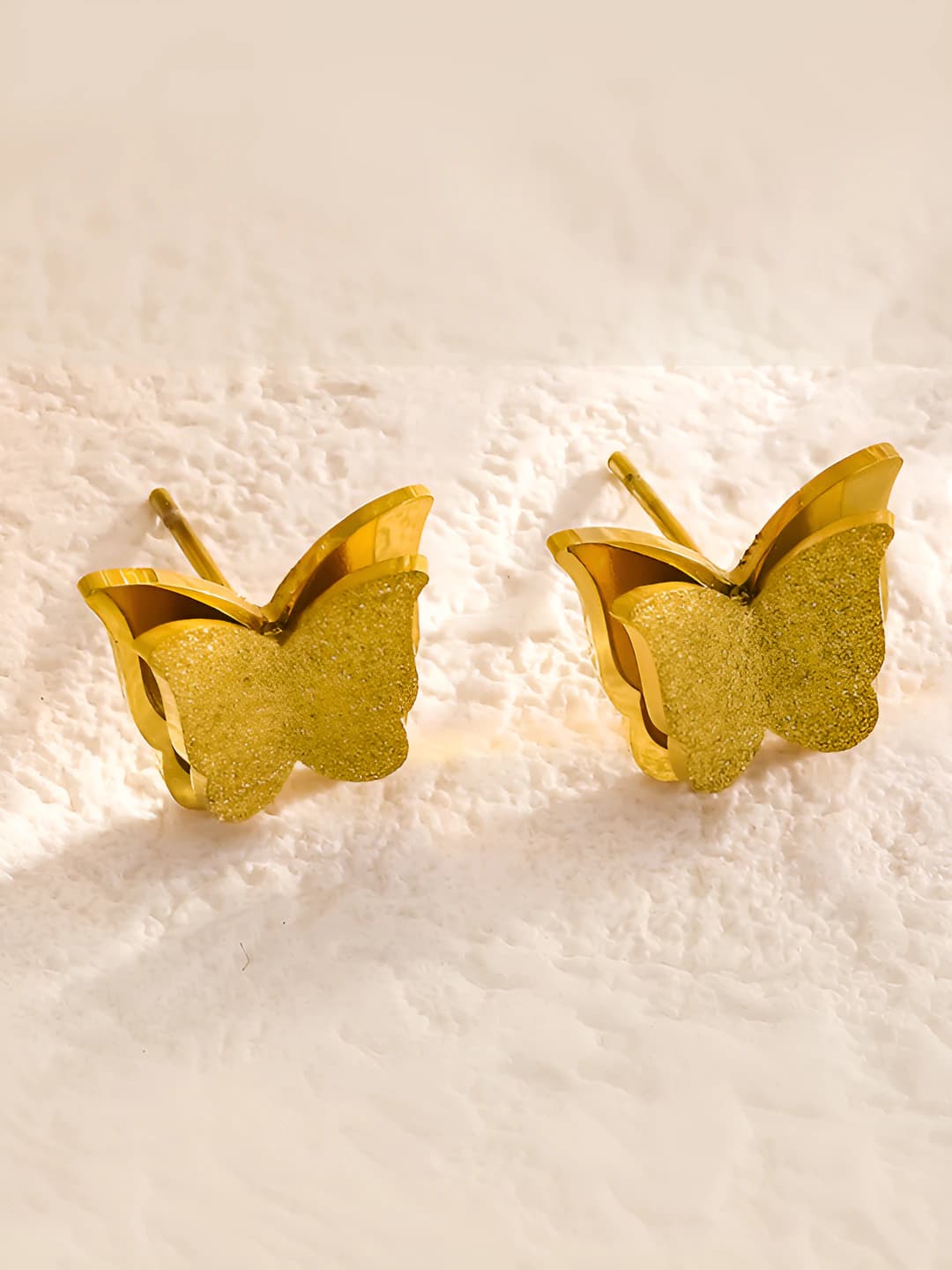 Gold butterfly earrings