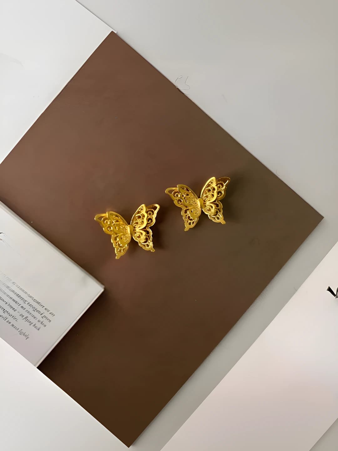 Gold filigree butterfly stud
