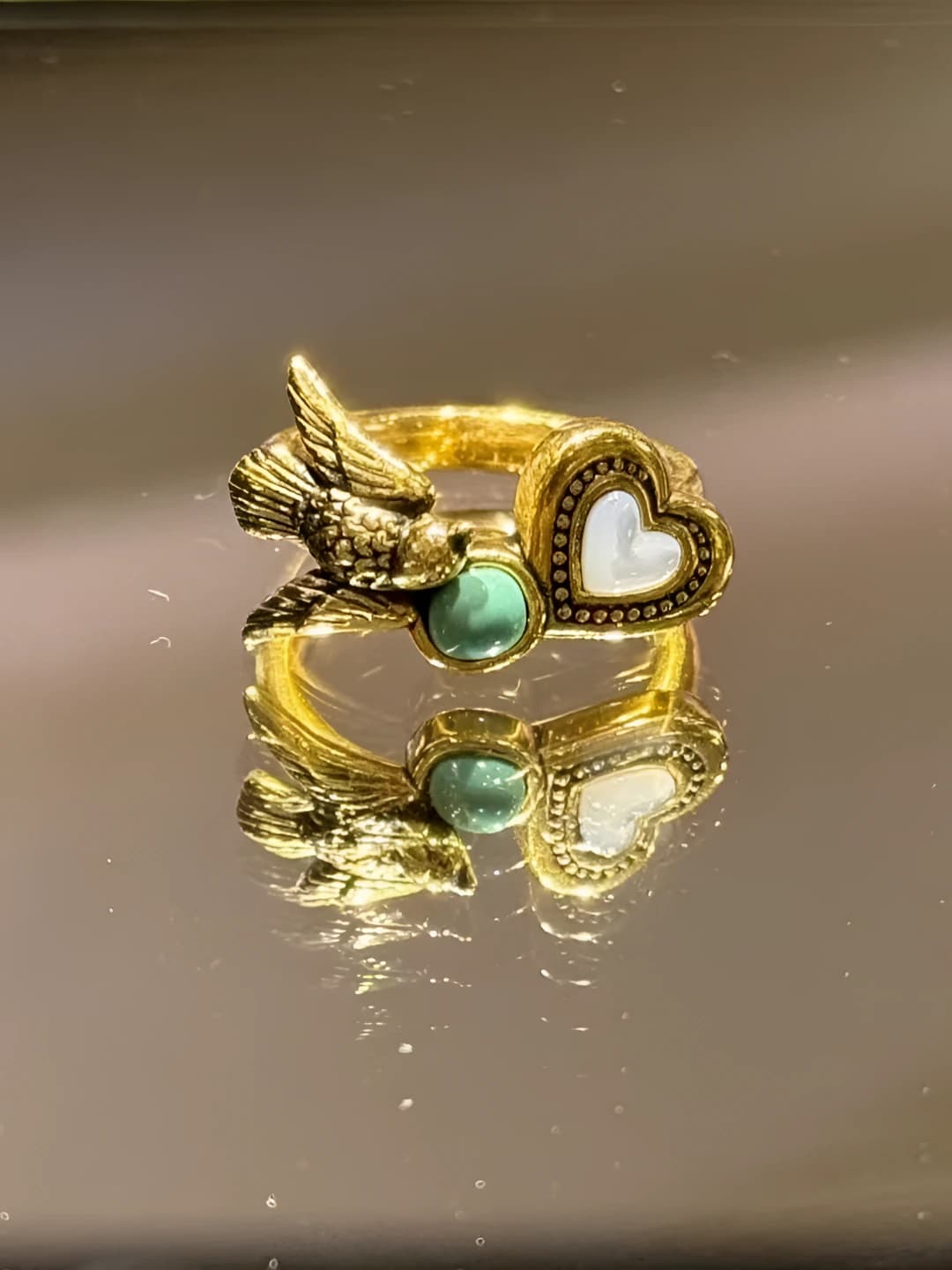 Heart and bird ring J1209D