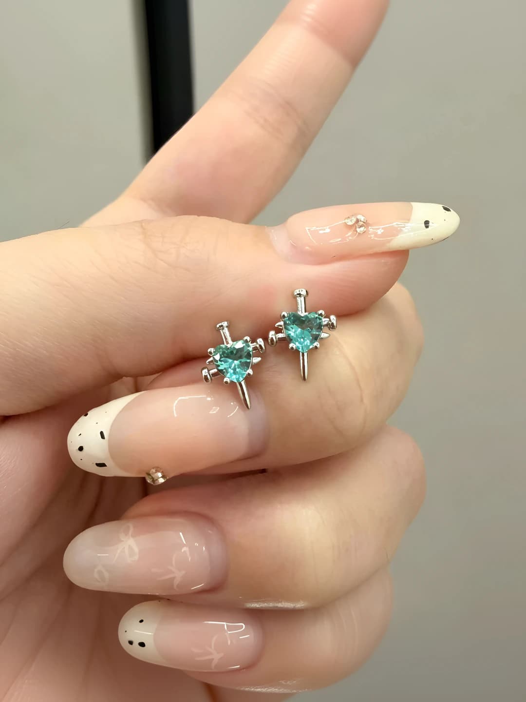 Women's 316L titanium steel stud earrings with small Paraiba green cross