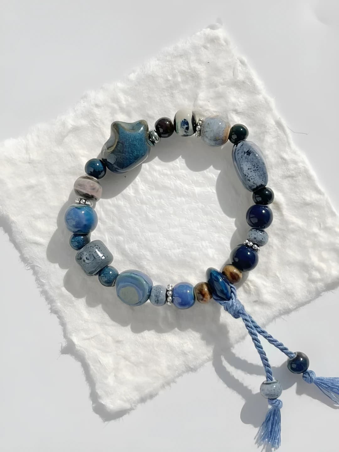 Women's ceramic beaded bracelet with star design