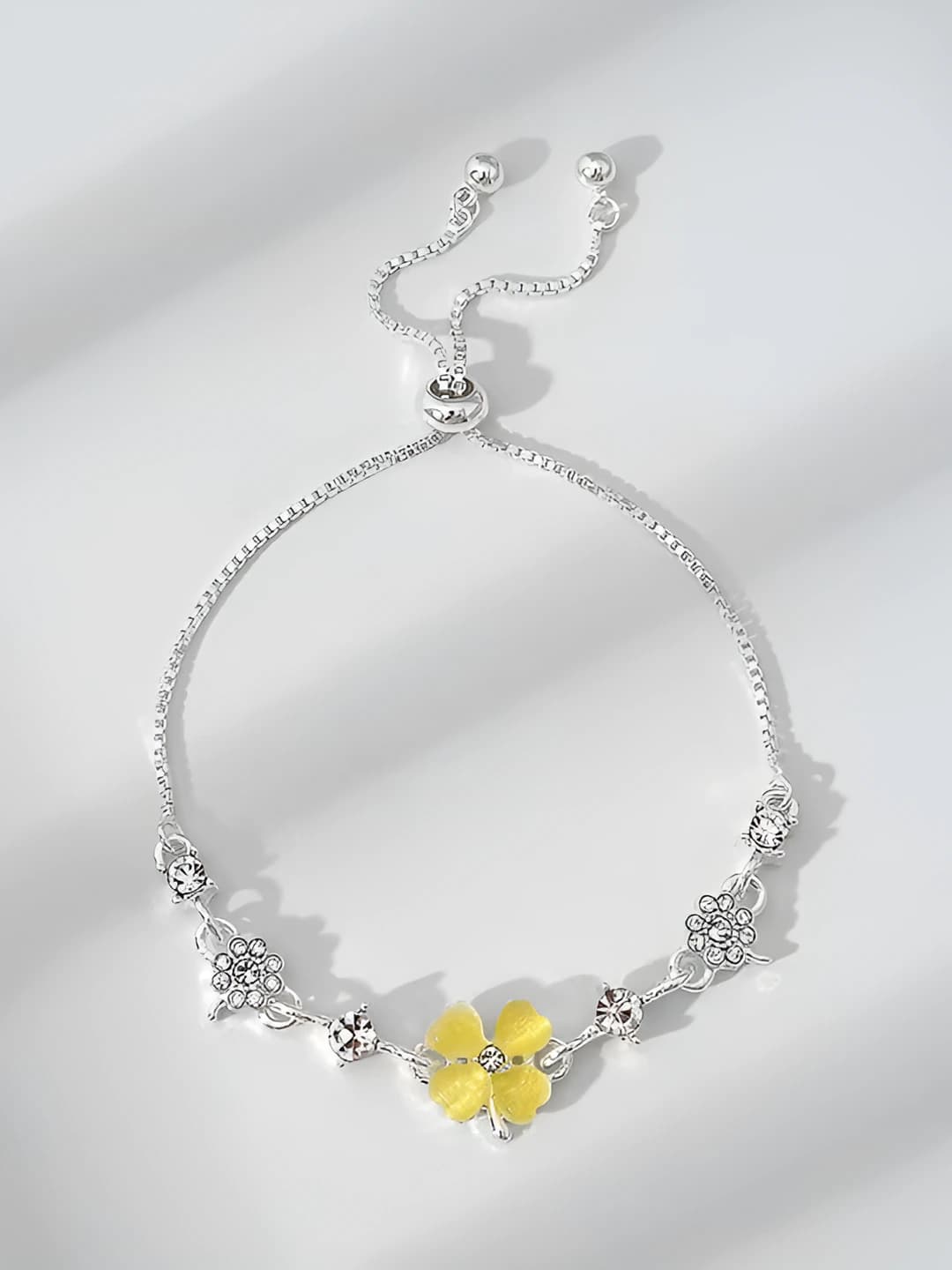 Bracelet: adjustable champagne four-leaf clover
