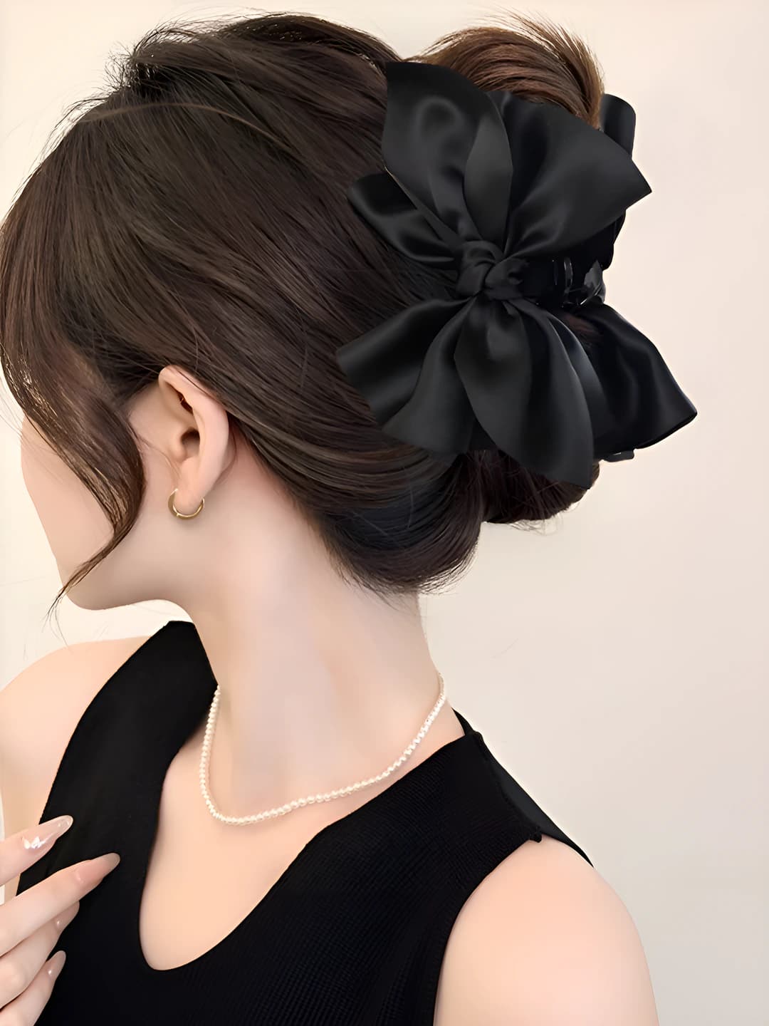 Black, multi-layer bow