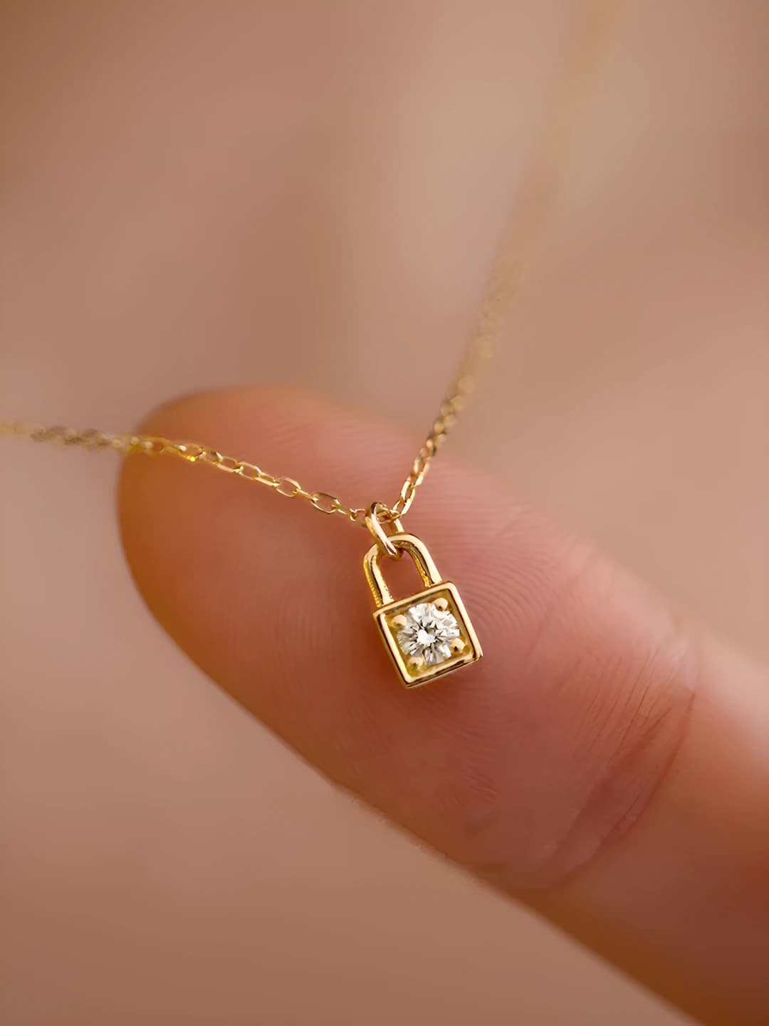 Women's mini lock pendant necklace in French style, designer chain with lock design element