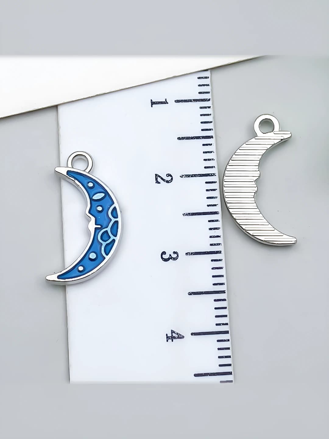 White K, light blue moon, 9x17mm, 0.6g