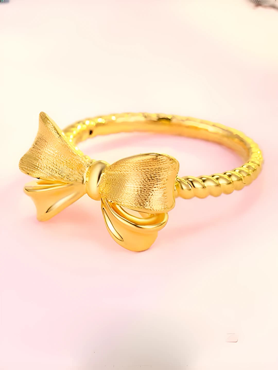 Women's gold-plated bow ring