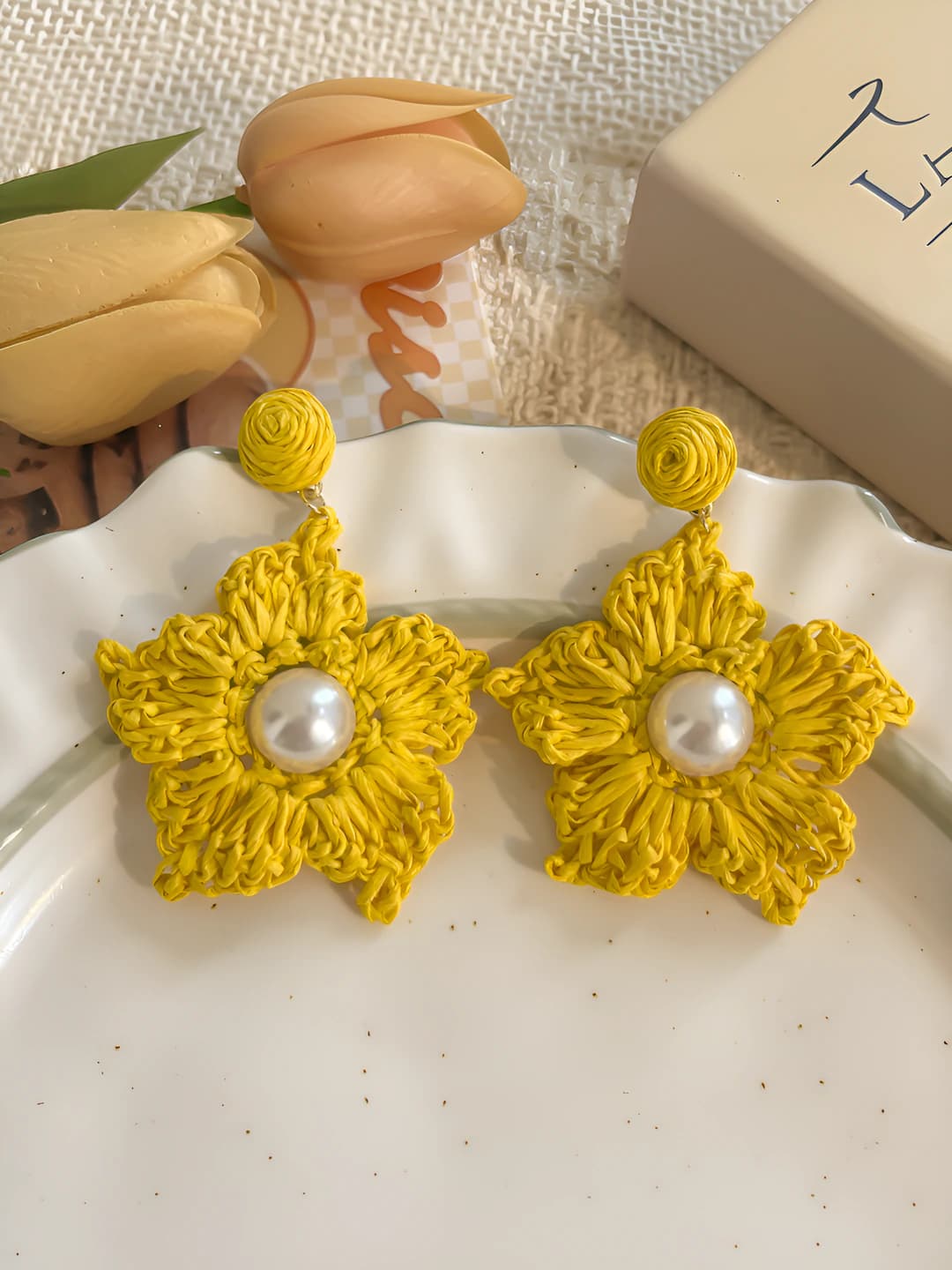 Yellow woven pearl star studs, 925