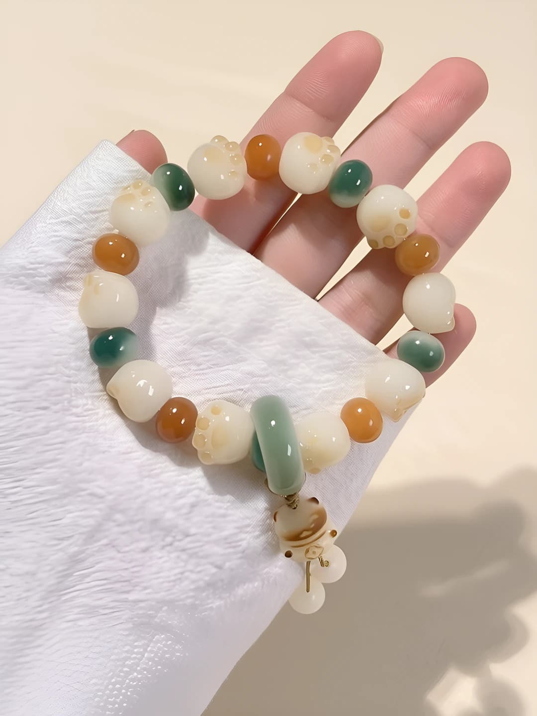 Women's beaded bracelet made of glass and lubistok, handmade, animal shape, cute and fun style
