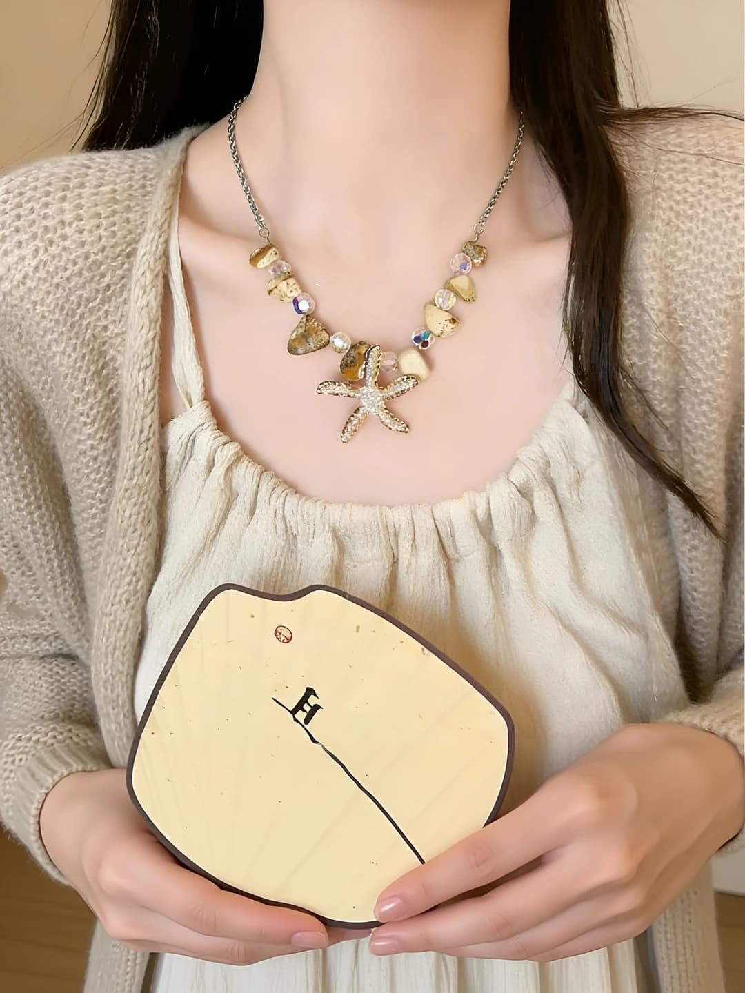Women's pendants with geometric shape, braided cord, stone and pearl pendant