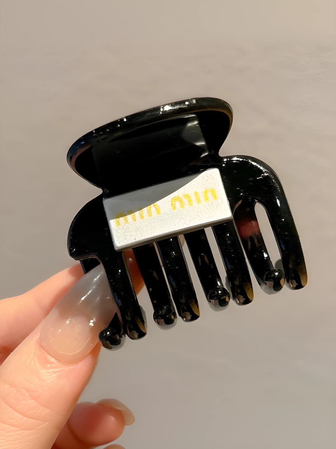 Miu letters black clip ~4.5 cm
