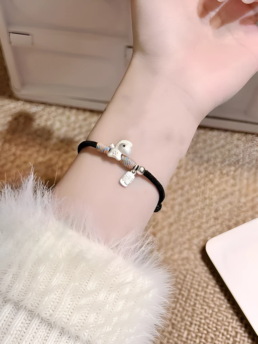S482 Silver horse bracelet, black cord