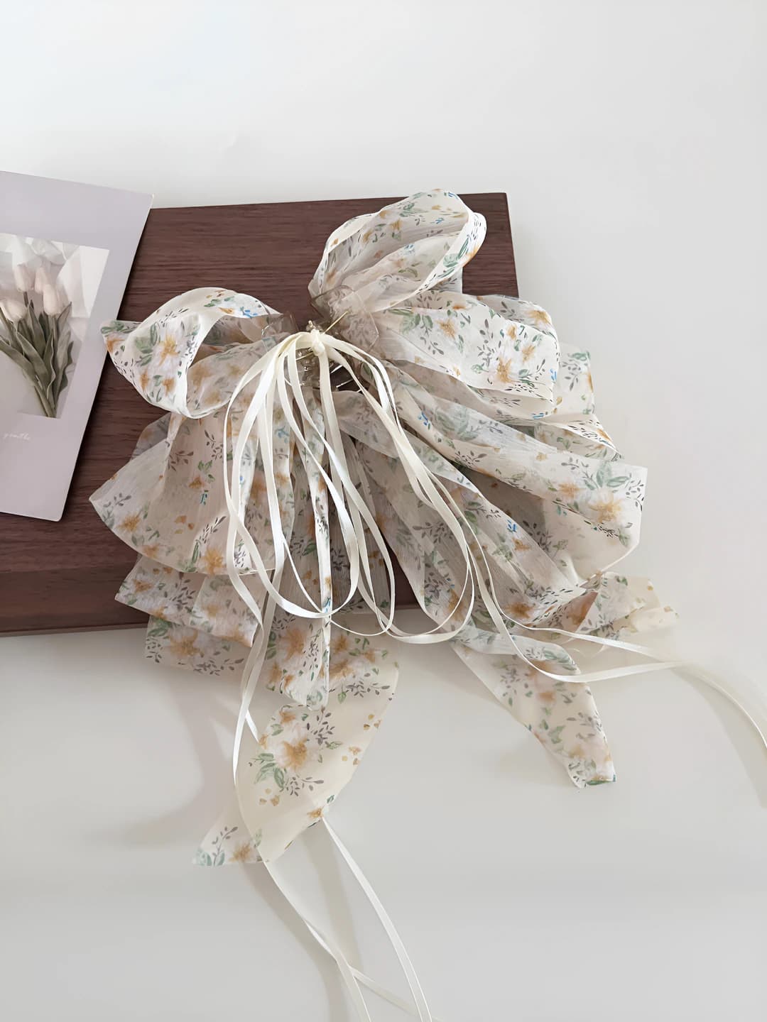 Yellow floral ribbon ponytail clip