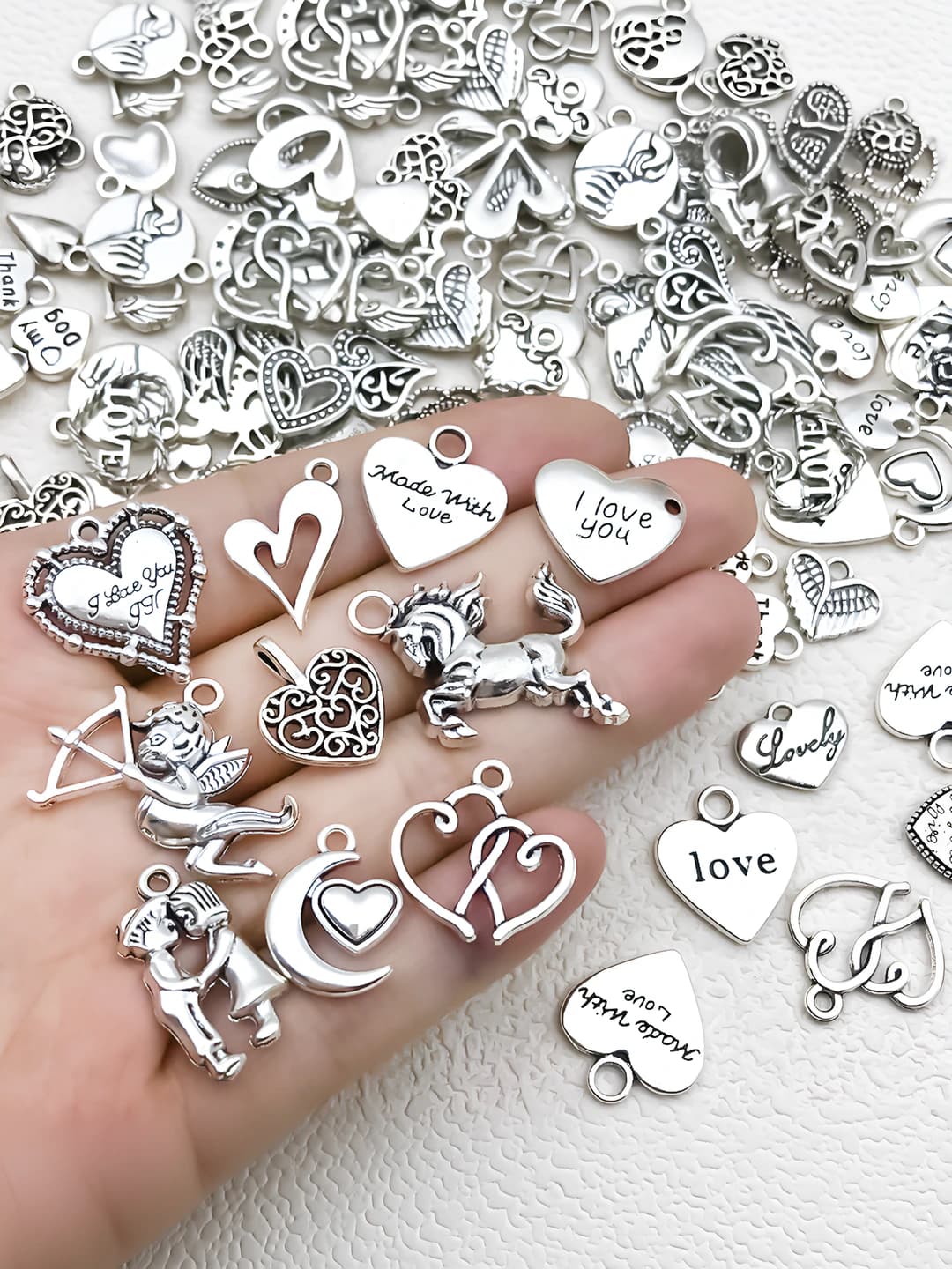 Random 100 pcs, antique silver, 114.5g