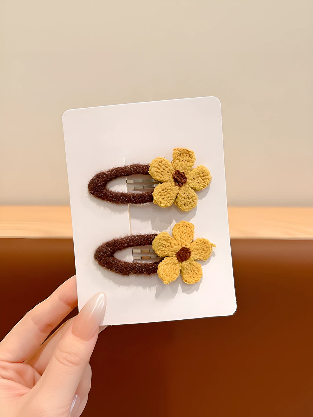 Yellow knitted floral clip, ~6 cm