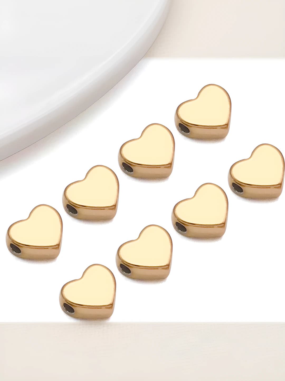 Gold heart, 7x8x3mm, 0.84g