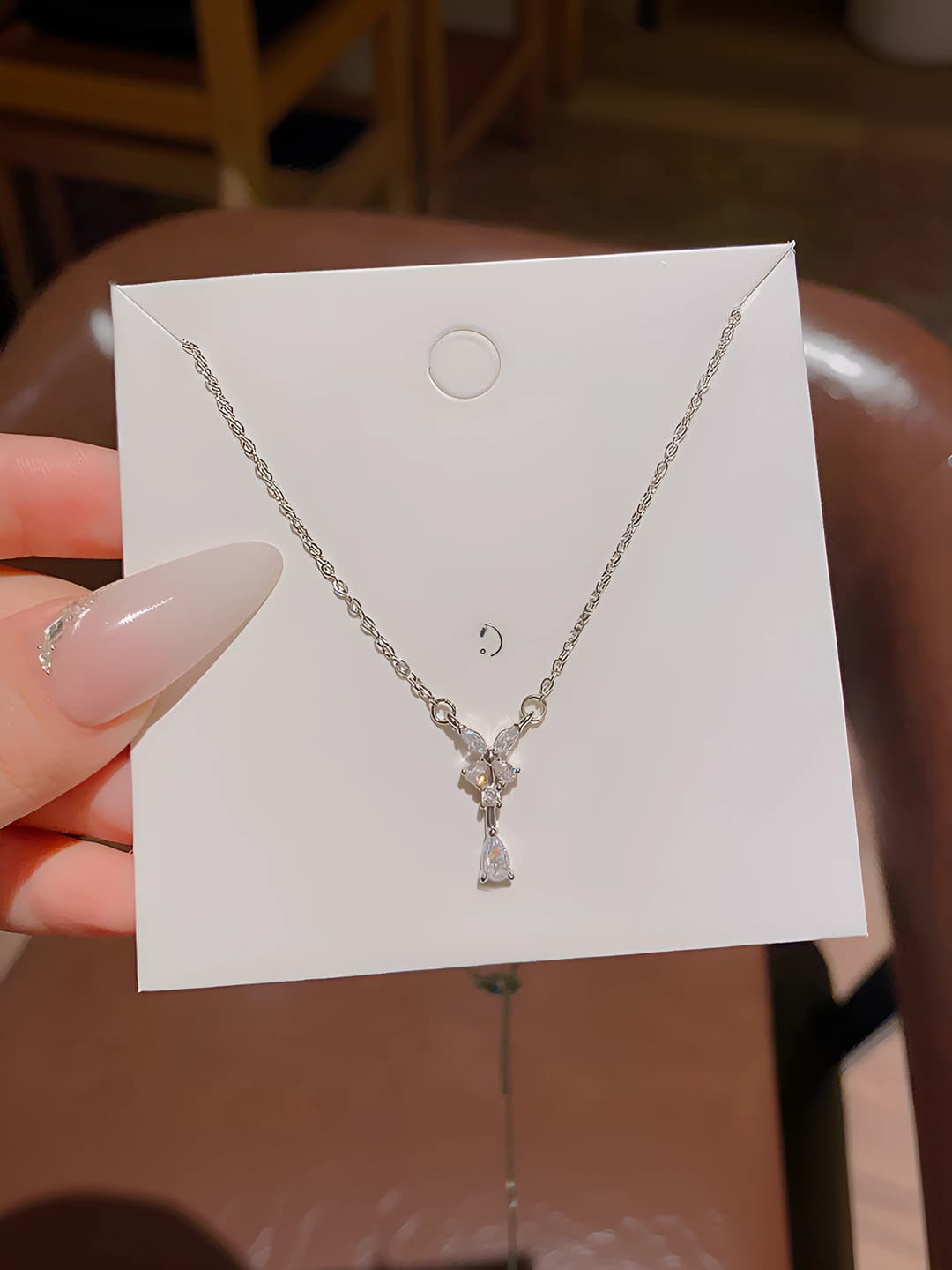 Women's teardrop zircon pendant necklace on titanium steel, butterfly design, casual style