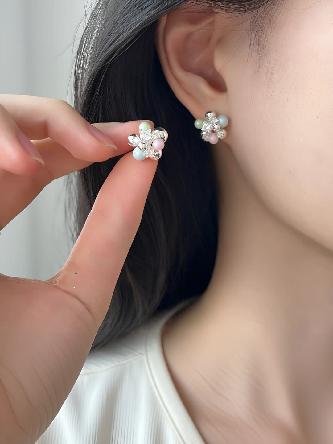 Women's pearl stud earrings in pink and purple, silver post