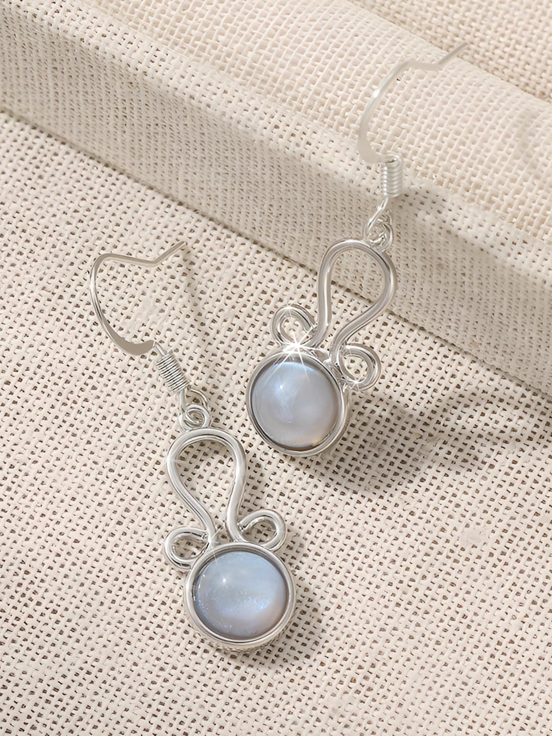 Women's bronze earrings in retro style, geometric design element