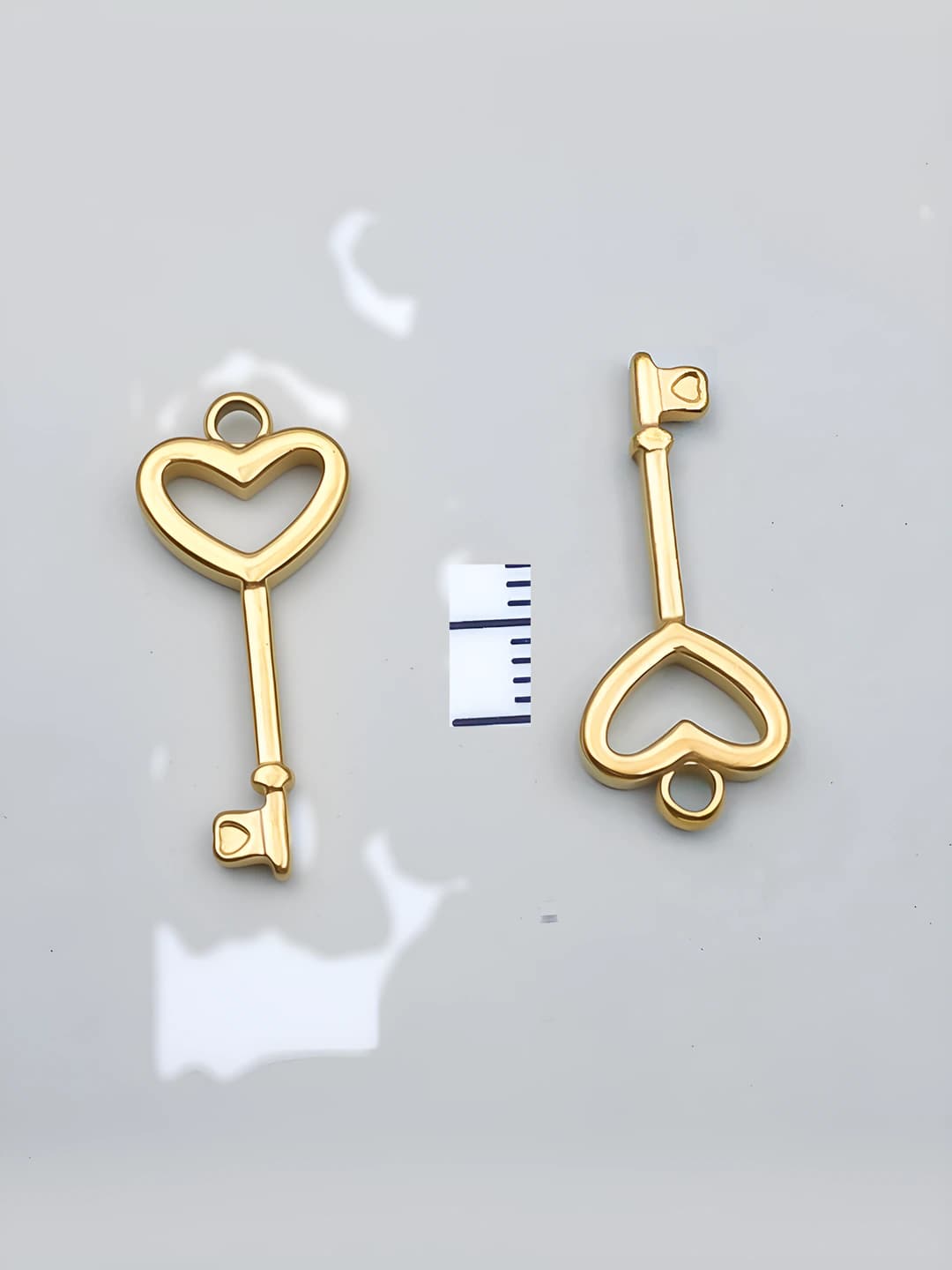 1 dona 11x25x2mm teshik 2.2mm oltin rangli po'lat yurak kalit-1.1g