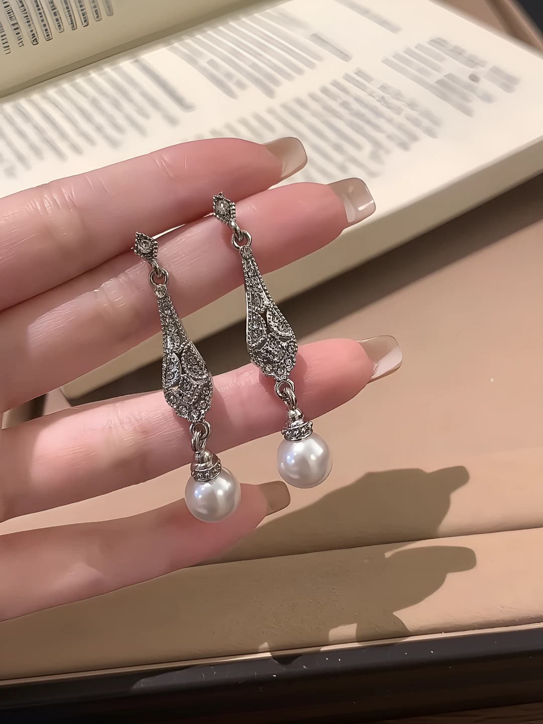 Silver pearl earrings