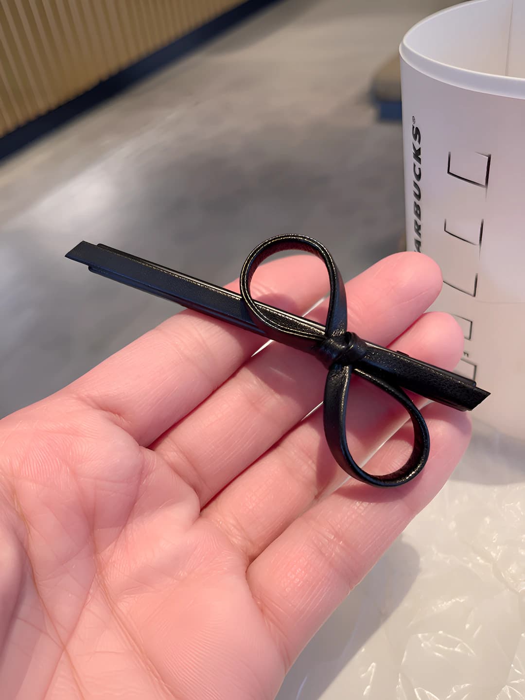 Black diagonal bow style