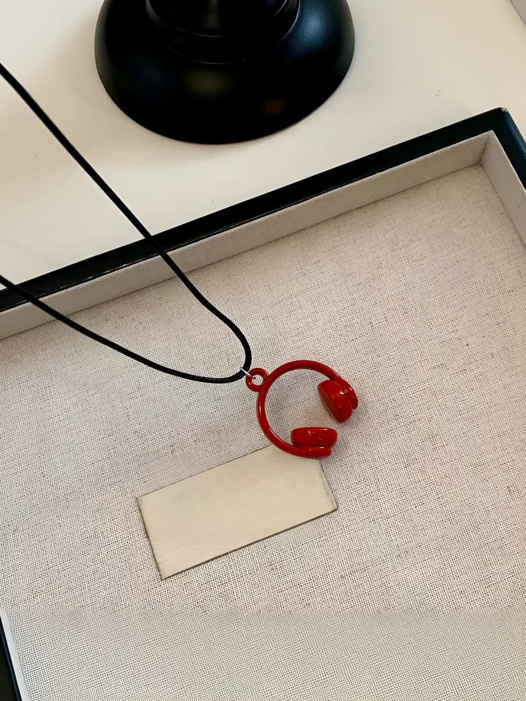 X295 headphone necklace, red