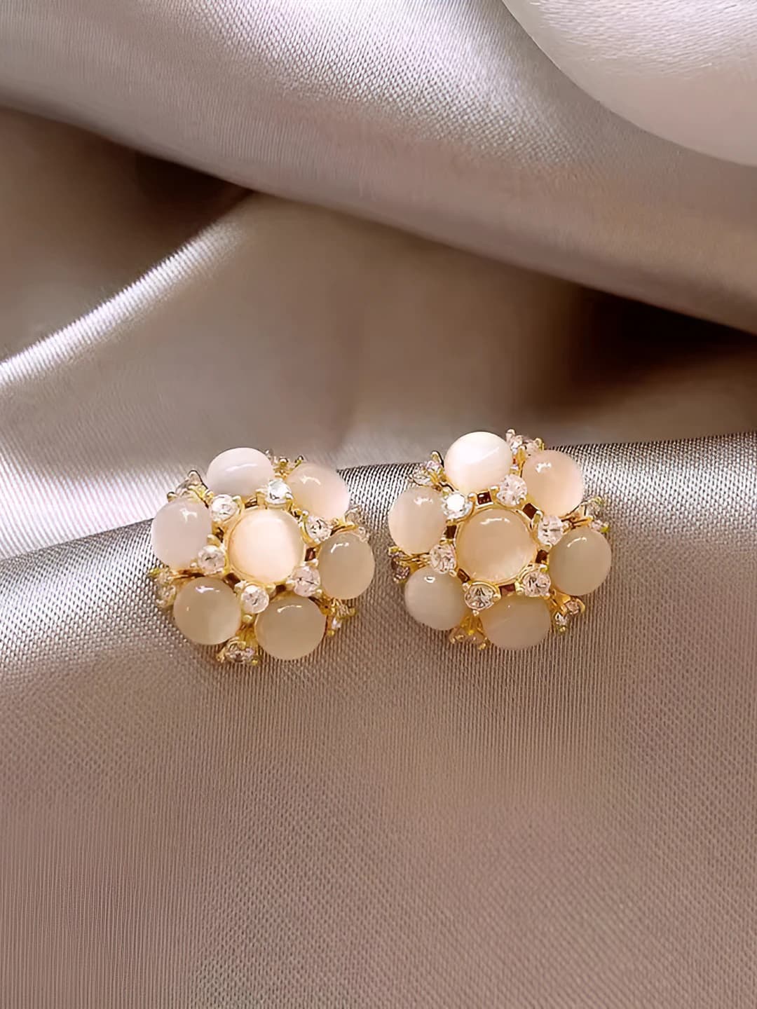 Women's stud earrings with cat's eye stone and zircon flower, light luxury style, modern design element