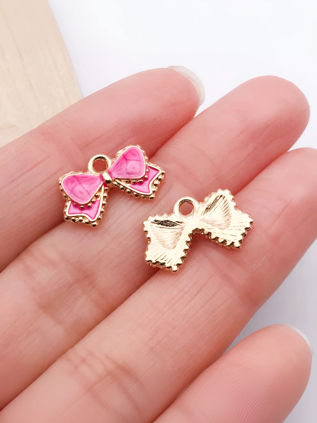 Rose red bow, 15.5x10mm, 0.8g