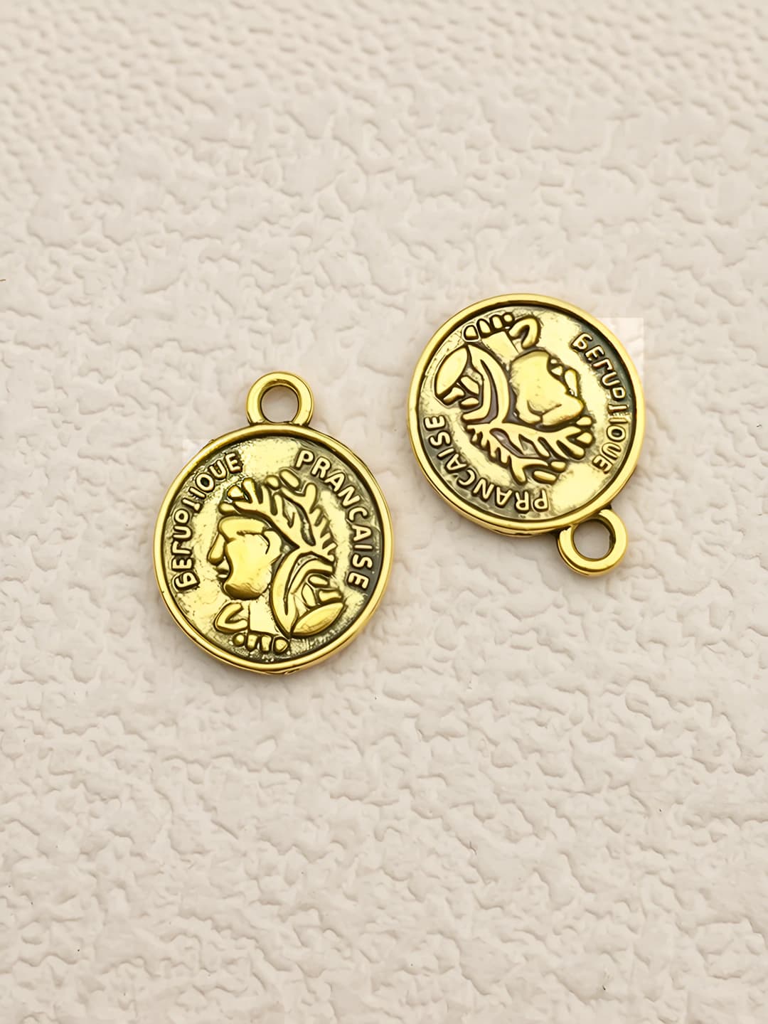 1 dona Doira yuzli tangacha 16x13mm-1.1g