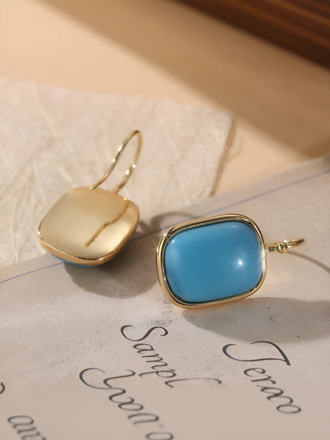 Women's copper earrings with geometric design element in retro style