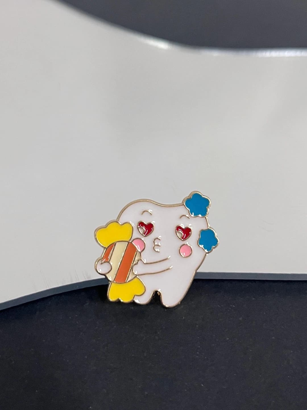 Teeth protection brooch