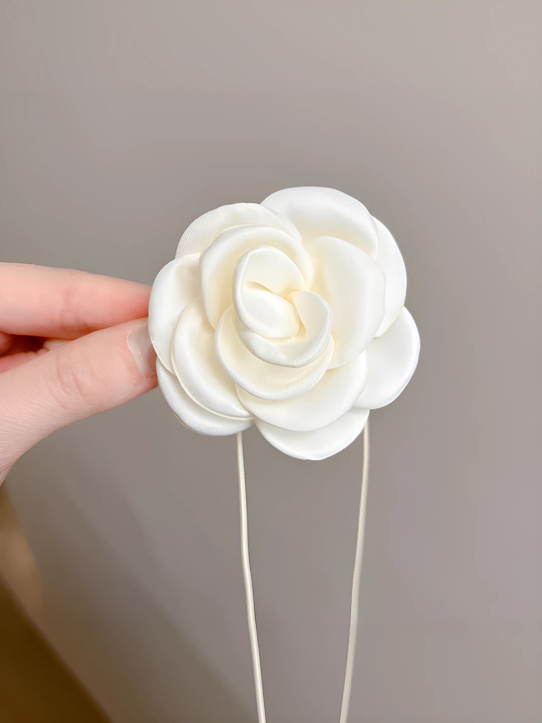 Off-white fabric flower