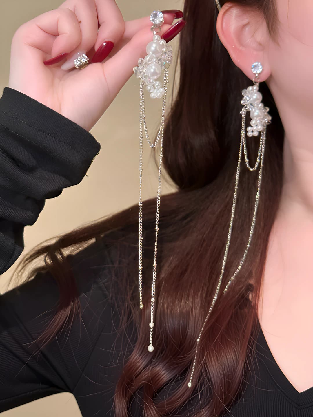 Women's long and statement pearl tassel earrings, 2026, ins style design element