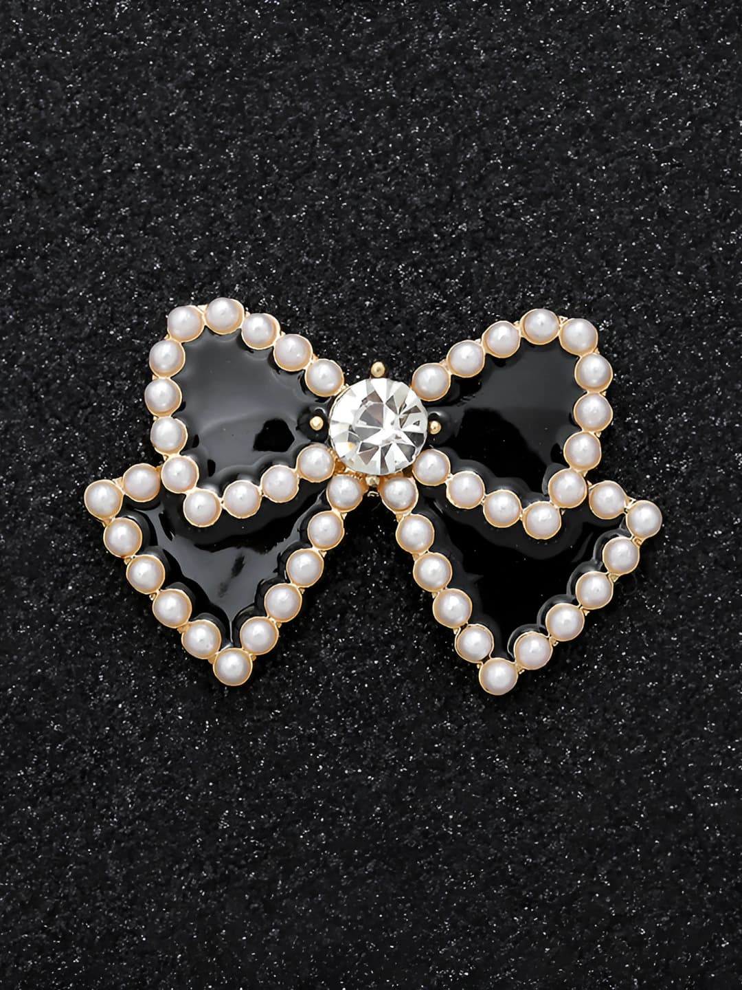 Gold base, black bow