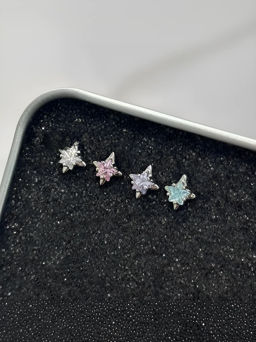 Blue 4-point star titanium 1 pc