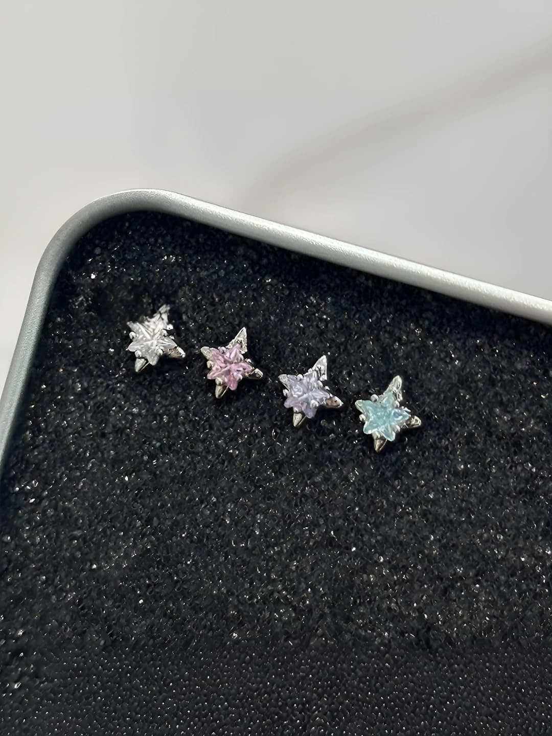 Purple 4-point star titanium 1 pc