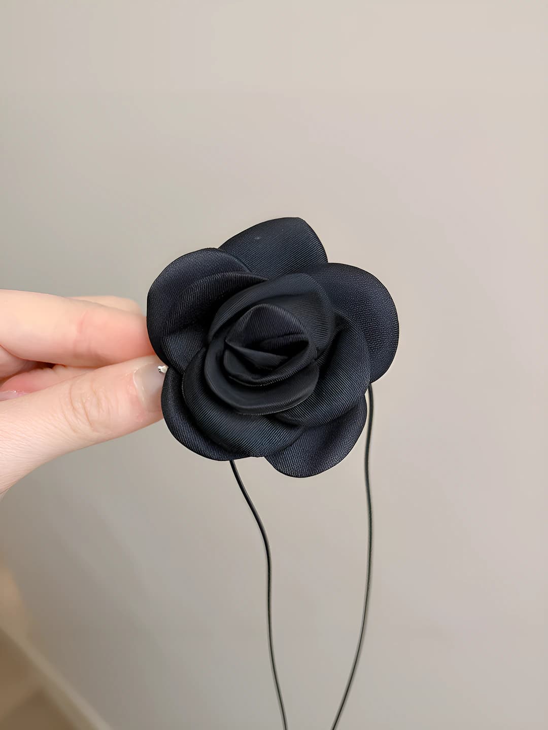Black fabric flower
