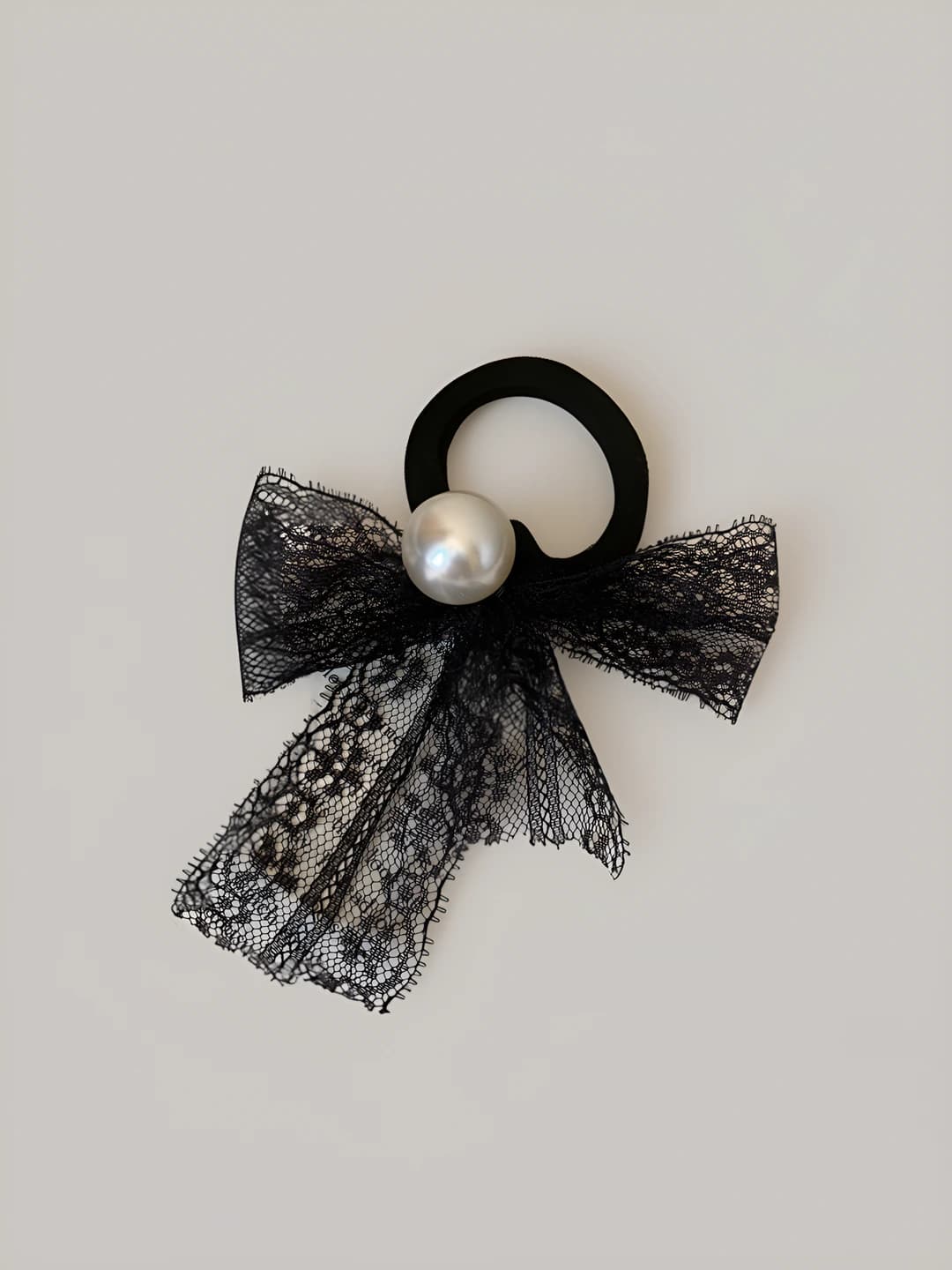Lace pearl bow