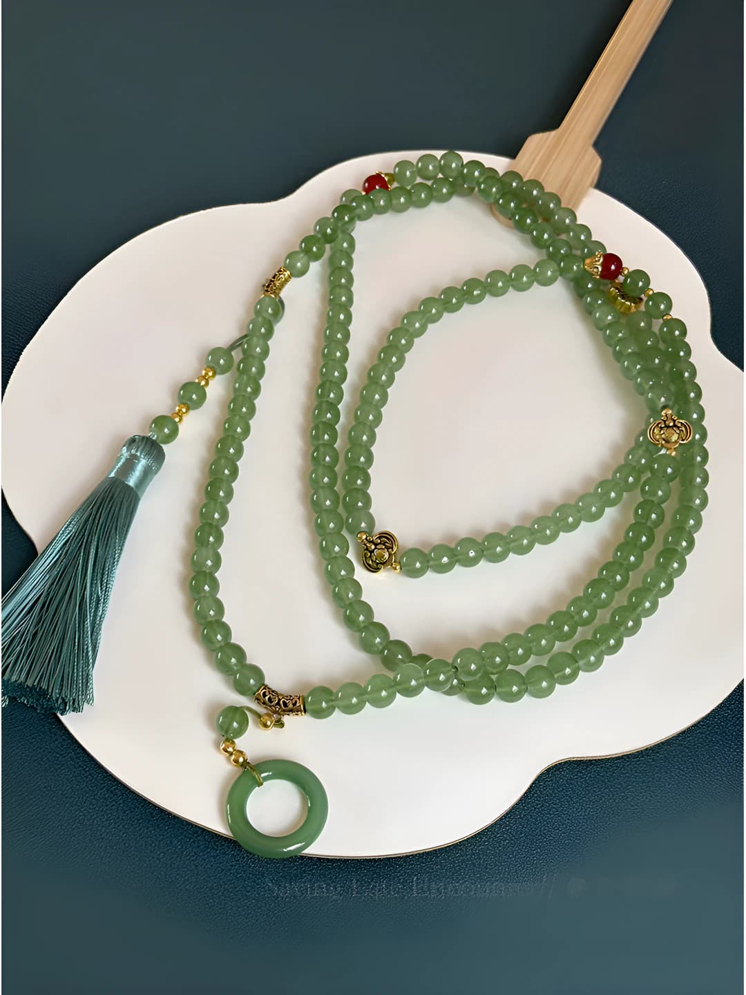 Golden green tassel necklace