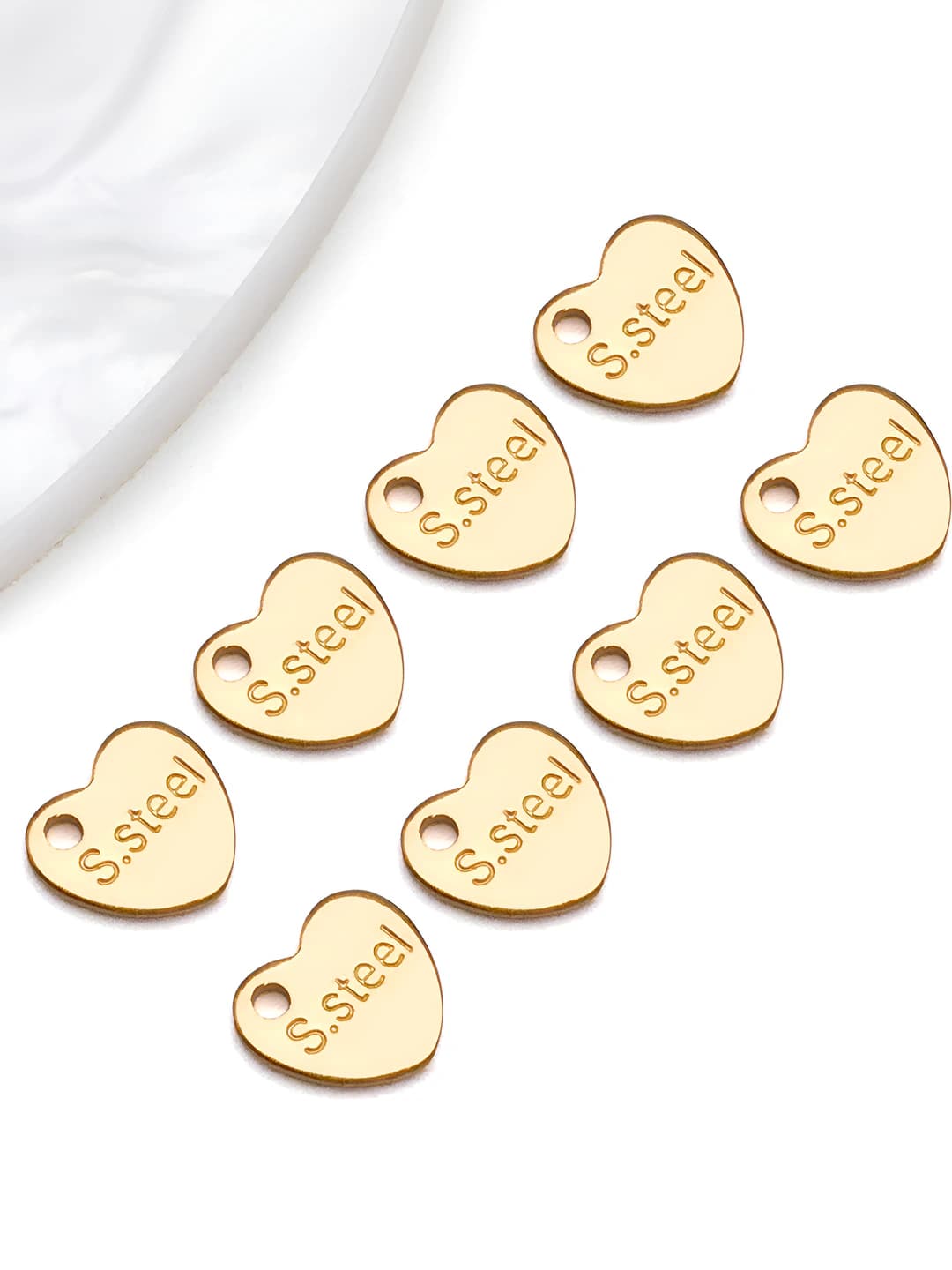 Gold steel heart charm 6x7x1mm