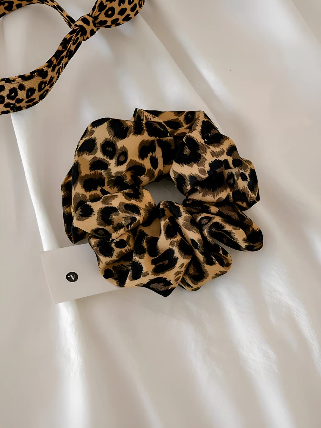 To'q leopard tutqich