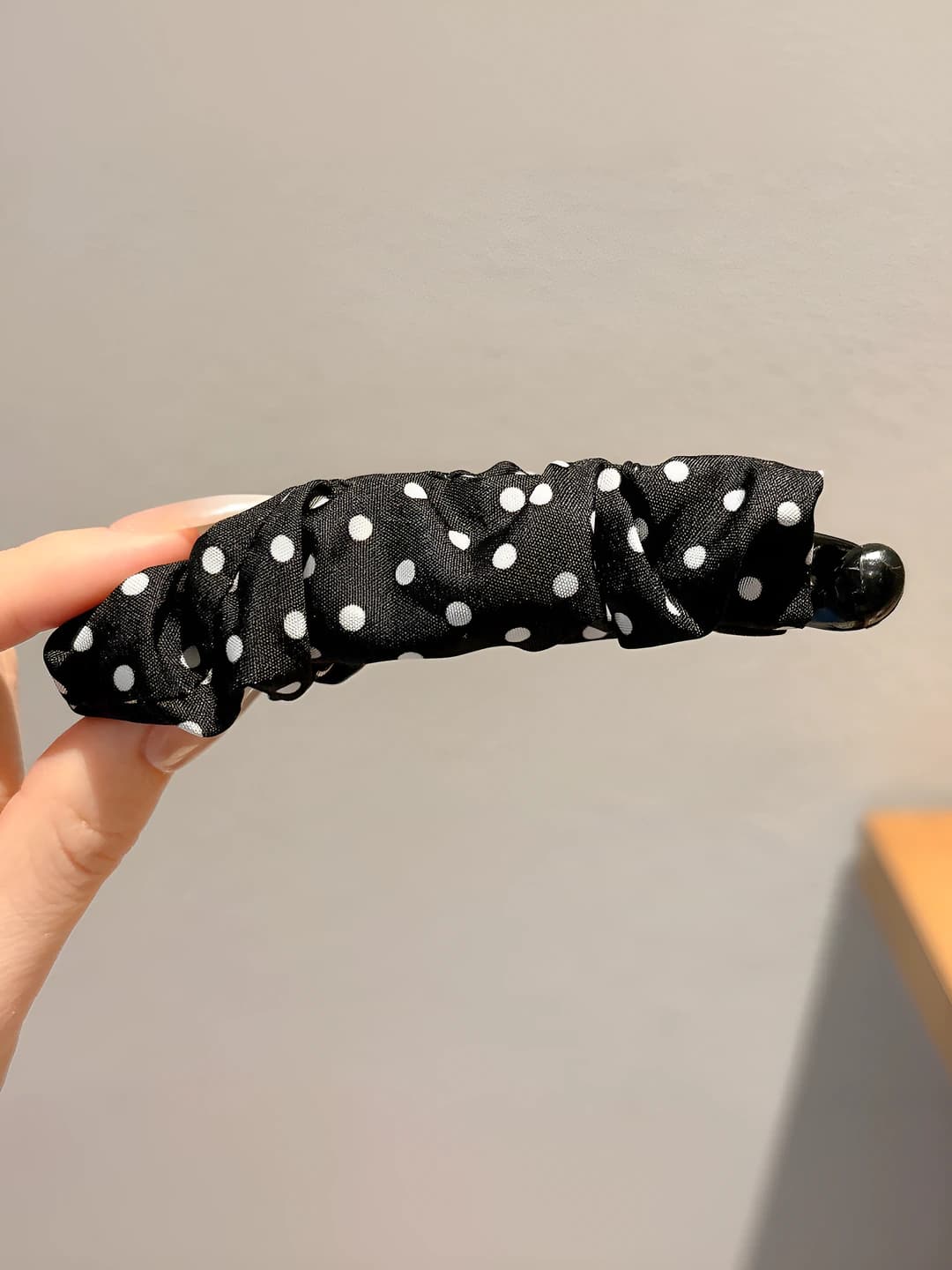 Black-white polka dot, ~10 cm