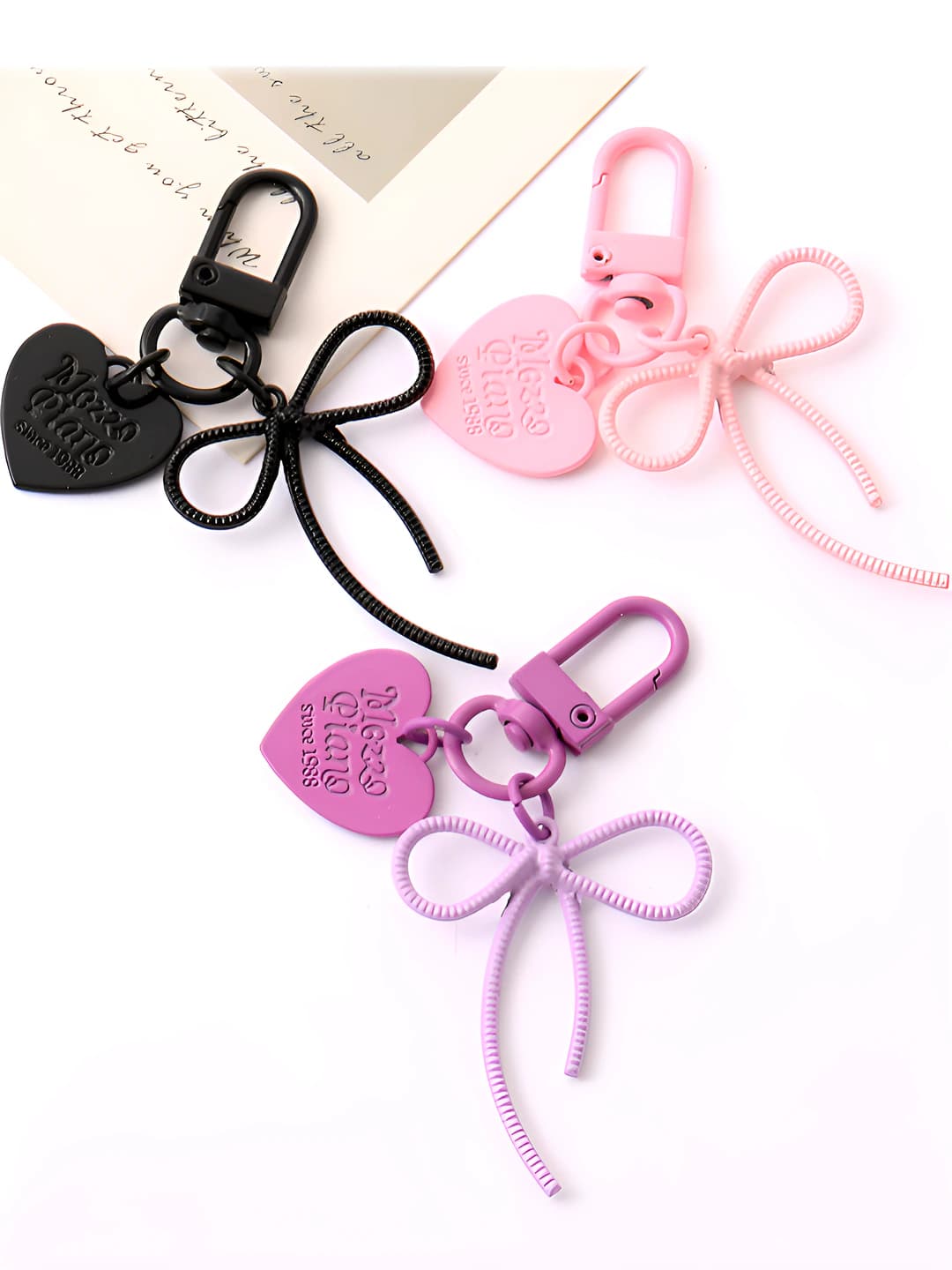 Women's keychain: metal, heart, butterfly and bow