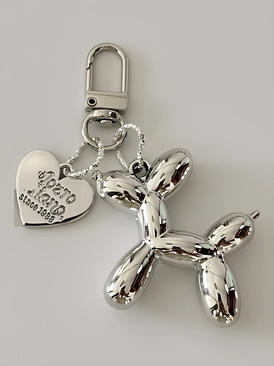 Silver balloon dog keychain
